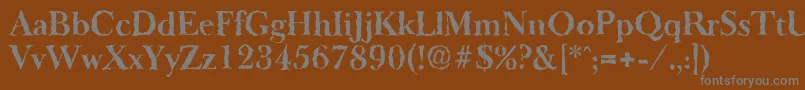 BaskeroldrandomBold-fontti – harmaat kirjasimet ruskealla taustalla