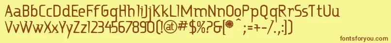 Ritabd Font – Brown Fonts on Yellow Background