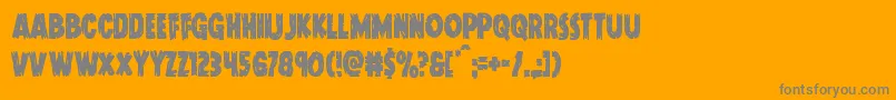 フォントDoktermonstrocond – オレンジの背景に灰色の文字