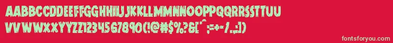 Doktermonstrocond Font – Green Fonts on Red Background