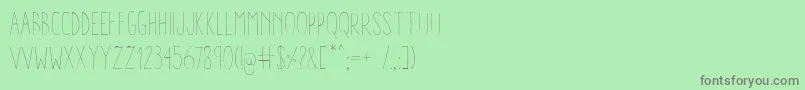 フォントAracneCondensedLight – 緑の背景に灰色の文字
