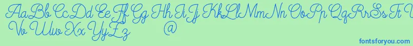 Mooglonk-Schriftart – Blaue Schriften auf grünem Hintergrund