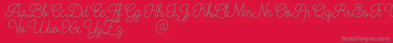 フォントMooglonk – 赤い背景に灰色の文字