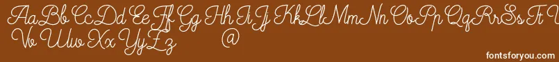フォントMooglonk – 茶色の背景に白い文字