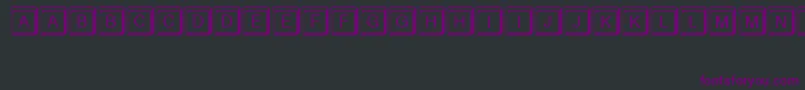 Czcionka KeystrokeRegular – fioletowe czcionki na czarnym tle
