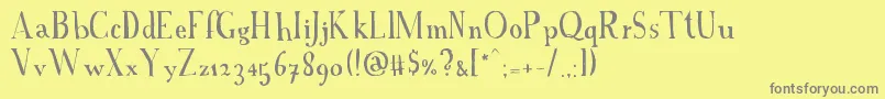 AFontWithSerifs-fontti – harmaat kirjasimet keltaisella taustalla