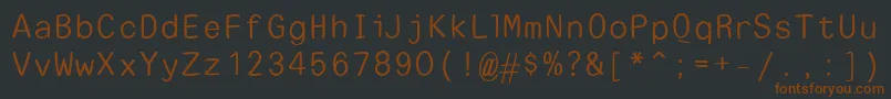 Шрифт EscapetypewritersansLight – коричневые шрифты на чёрном фоне