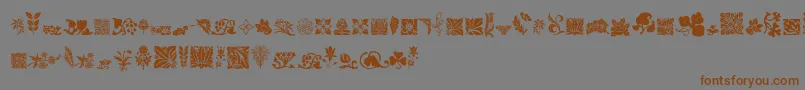 フォントRoughFlowers – 茶色の文字が灰色の背景にあります。