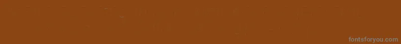 Czcionka FirasansTwoitalic – szare czcionki na brązowym tle