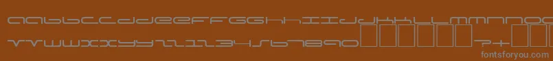 DsPoddCyrLight-fontti – harmaat kirjasimet ruskealla taustalla