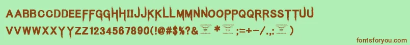 KingsbutcherRegular Font – Brown Fonts on Green Background
