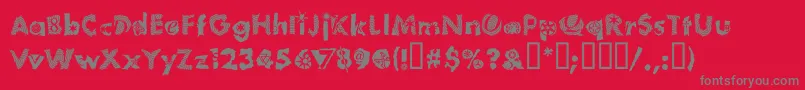 TomfoolPlumloco-Schriftart – Graue Schriften auf rotem Hintergrund