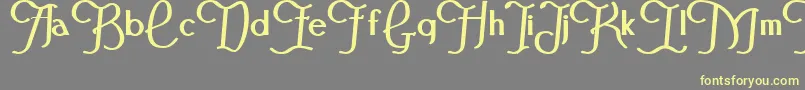 FestivalflourishBold-Schriftart – Gelbe Schriften auf grauem Hintergrund