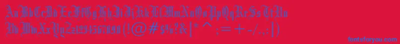 Czcionka Drpogothicc – niebieskie czcionki na czerwonym tle