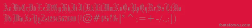 Drpogothicc-fontti – harmaat kirjasimet punaisella taustalla