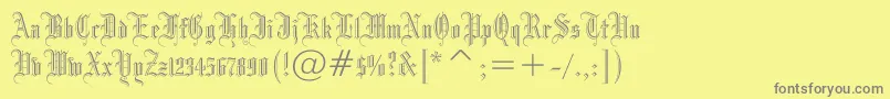 Drpogothicc-fontti – harmaat kirjasimet keltaisella taustalla