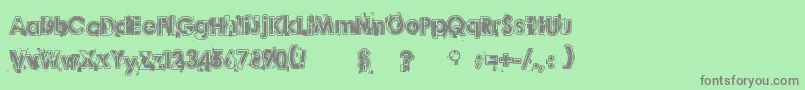 Desperado-fontti – harmaat kirjasimet vihreällä taustalla