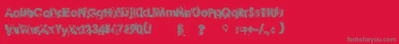Desperado-fontti – harmaat kirjasimet punaisella taustalla