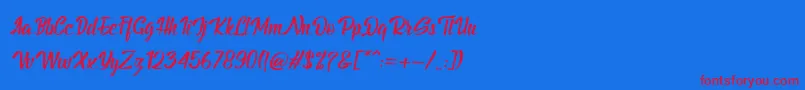 BillyTheGangItalic Font – Red Fonts on Blue Background