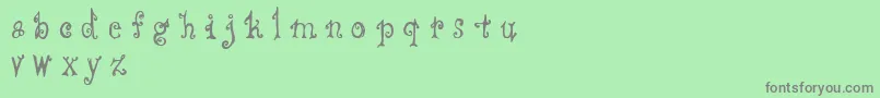 フォントCffredostyle – 緑の背景に灰色の文字