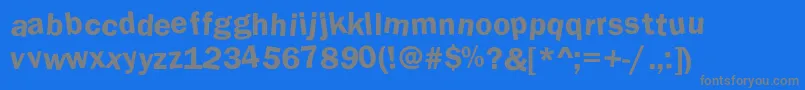 DdafttL-fontti – harmaat kirjasimet sinisellä taustalla