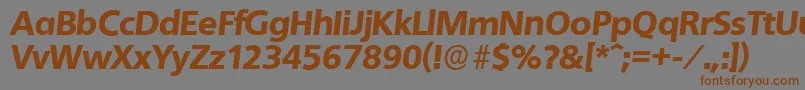 フォントQuebecserialHeavyItalic – 茶色の文字が灰色の背景にあります。