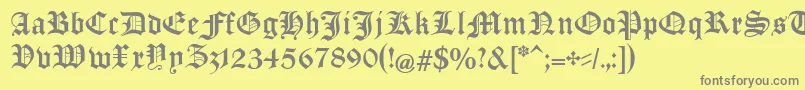 ManuskriptGothischUnz1a Font – Gray Fonts on Yellow Background