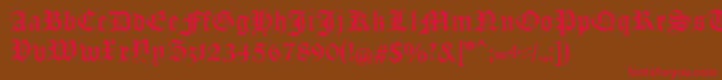 ManuskriptGothischUnz1a Font – Red Fonts on Brown Background