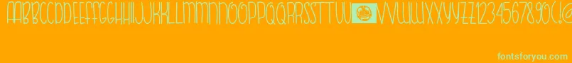 FishBear Font – Green Fonts on Orange Background
