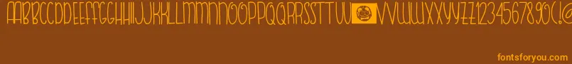 FishBear Font – Orange Fonts on Brown Background