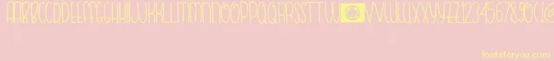 FishBear-Schriftart – Gelbe Schriften auf rosa Hintergrund