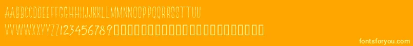 Czcionka TheRedlightLineFree – żółte czcionki na pomarańczowym tle