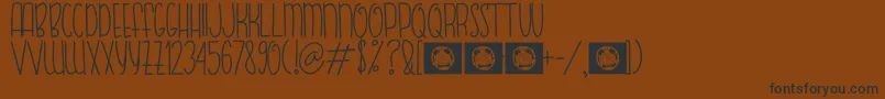 FishBear Font – Black Fonts on Brown Background