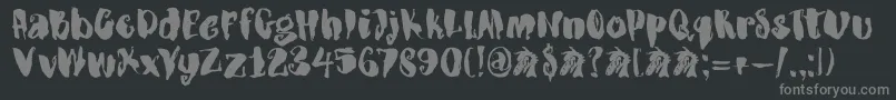 DkDragonblood-fontti – harmaat kirjasimet mustalla taustalla