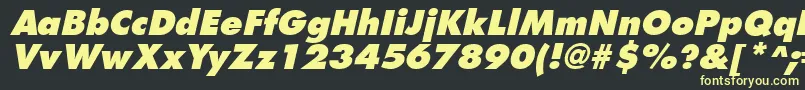 フォントFuturistextraboldItalic – 黒い背景に黄色の文字
