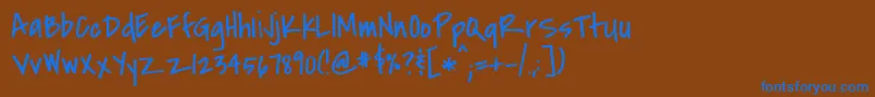 フォントCovered – 茶色の背景に青い文字