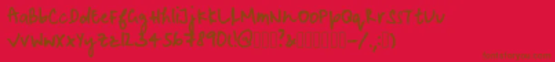 MaliniohtersboldRegular Font – Brown Fonts on Red Background
