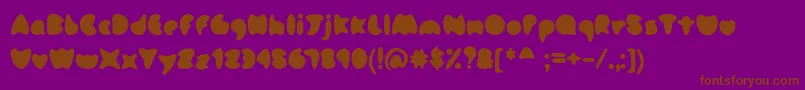 Omm Font – Brown Fonts on Purple Background