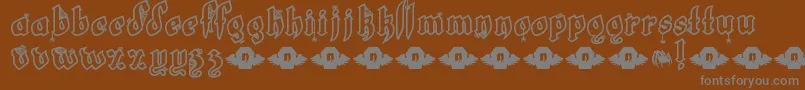 LrtWhiteFang Font – Gray Fonts on Brown Background