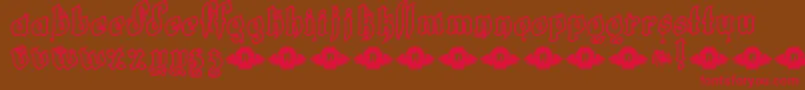 LrtWhiteFang-Schriftart – Rote Schriften auf braunem Hintergrund