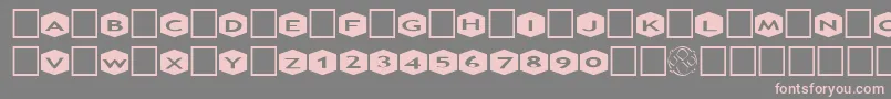 フォントAlphashapesHexagons3 – 灰色の背景にピンクのフォント