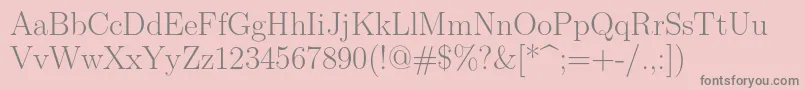 Lmroman17Regular-fontti – harmaat kirjasimet vaaleanpunaisella taustalla