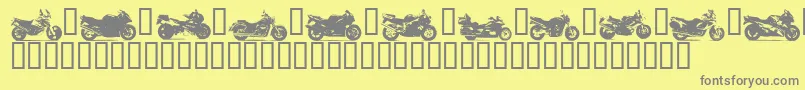 Motob-fontti – harmaat kirjasimet keltaisella taustalla