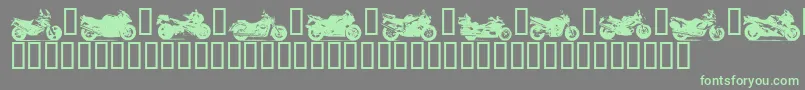フォントMotob – 灰色の背景に緑のフォント