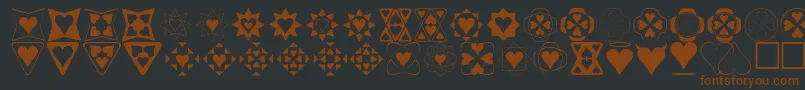Шрифт Heartthings – коричневые шрифты на чёрном фоне