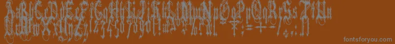 フォントVladtepesiivlads – 茶色の背景に灰色の文字