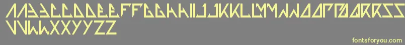 Thetrainingartist Font – Yellow Fonts on Gray Background
