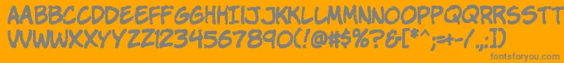 KomikaParch-Schriftart – Graue Schriften auf orangefarbenem Hintergrund