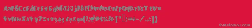 Fastostrich-fontti – harmaat kirjasimet punaisella taustalla