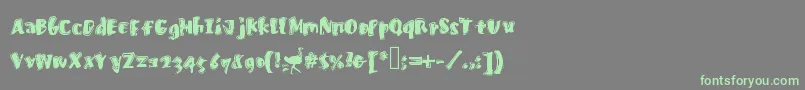 Fastostrich-Schriftart – Grüne Schriften auf grauem Hintergrund